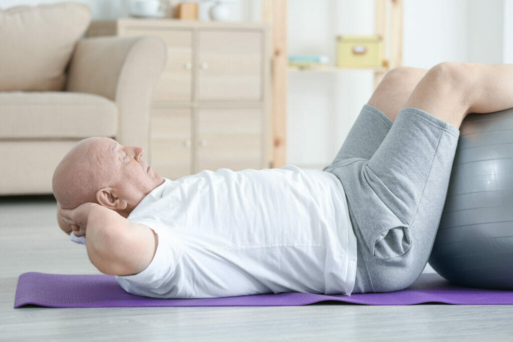 Older Man Exercising To Belly Fat